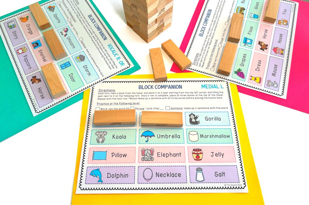 Three "Block Companion" activity pages with target sound images partially covered in Jenga board game blocks, all surrounding a Jenga block tower in the center. This image depicts how Jenga can be used as an easy board game for articulation therapy.